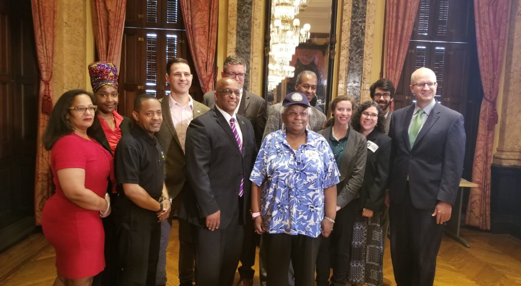 Advocates with Mayor Jack Young at bill signing.