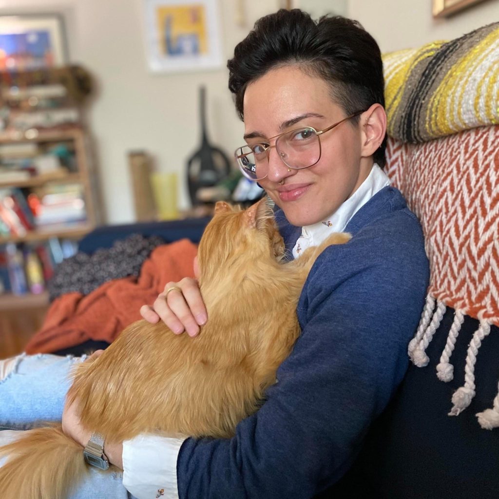 Photo of Amanda Insalaco holding a cat.