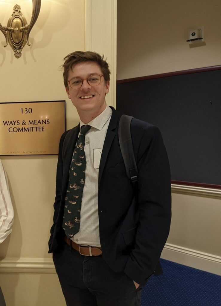 Levi Bradford standing outside the Maryland House of Delegates Ways & Means Committee hearing room